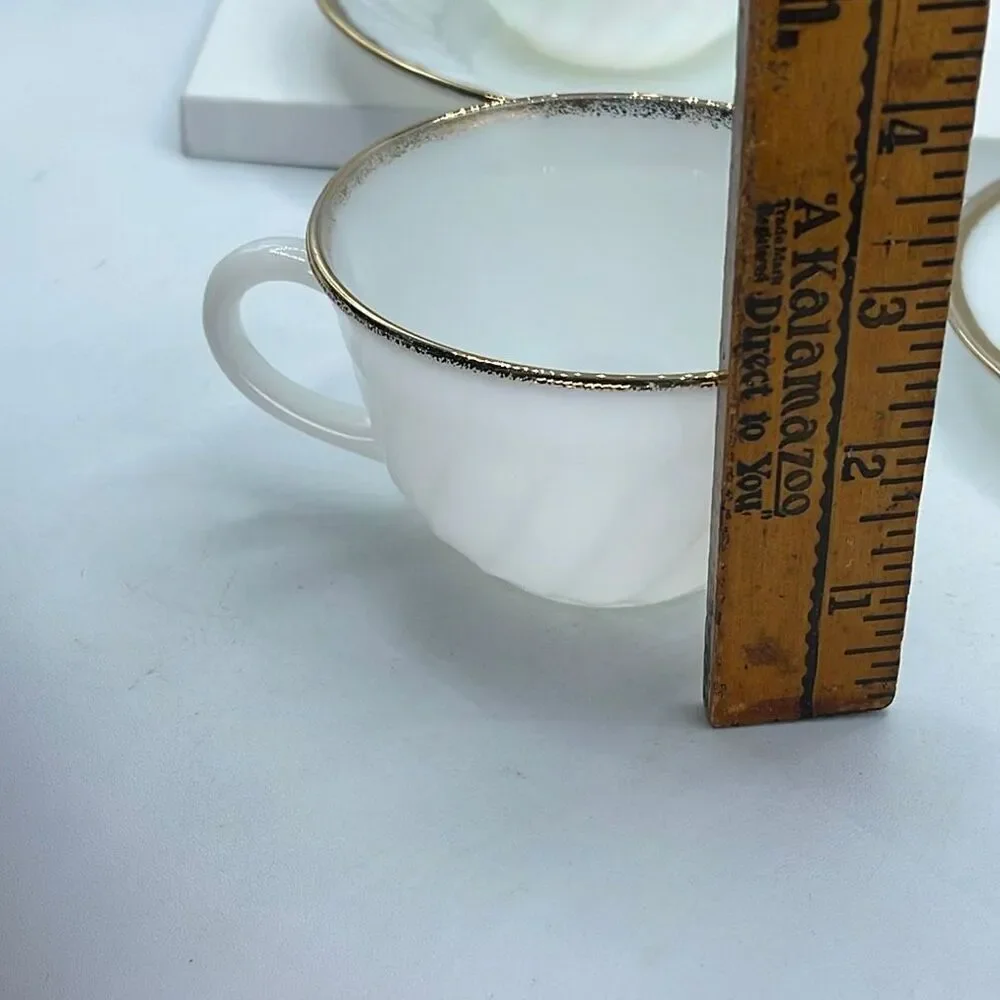Set of 2 Fire King milk glass swirl pattern cup & saucers.